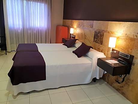 Quadruple Room (2 Adults + 2 Children)