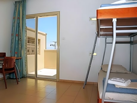 Single Bed in Female Dormitory Room