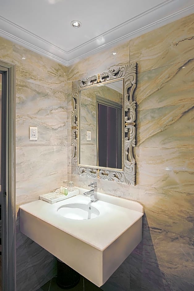 A & Em Corp - The Petit Hotel