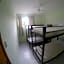 Paradise Hostel e Flats