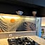 Flat PRAIA Home Experience Dante Michelini