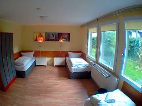 Economy Quadruple Room with Shared Bathroom