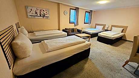 Quadruple Room with Shared Bathroom