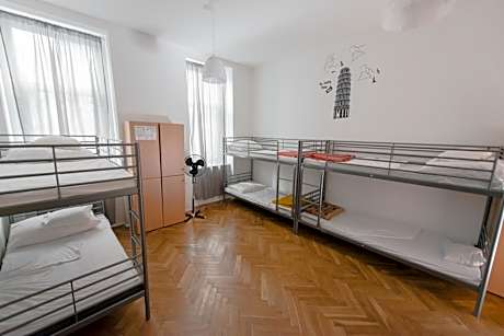 Bed in 14-Bed Dormitory Room with Shared Bathroom