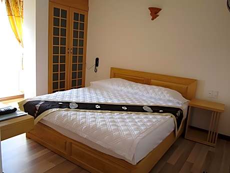 King Suite with Sofa Bed and Living Room