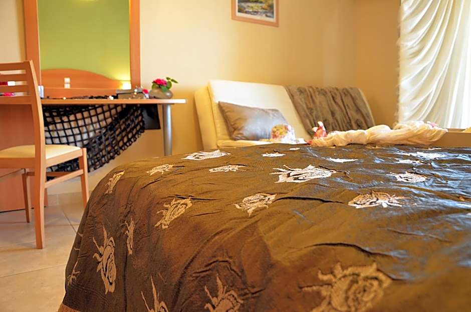 Belussi Beach Hotel & Suites