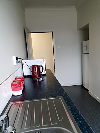 Family Room with Shared Bathroom