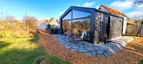 B&B het duinhuisje met jacuzzi, gratis parkeren, 2 fietsen te leen, airco