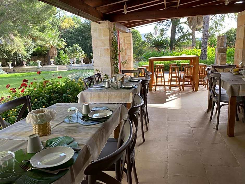 Palazzo de Carlo e il parco dei 7 pozzi