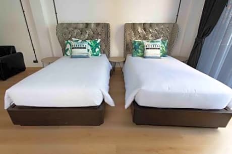 Studio Twin Room with Balcony (No Elevator, 4 Wing Stories)