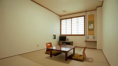 Japanese-Style Family Room with Shared Bathroom