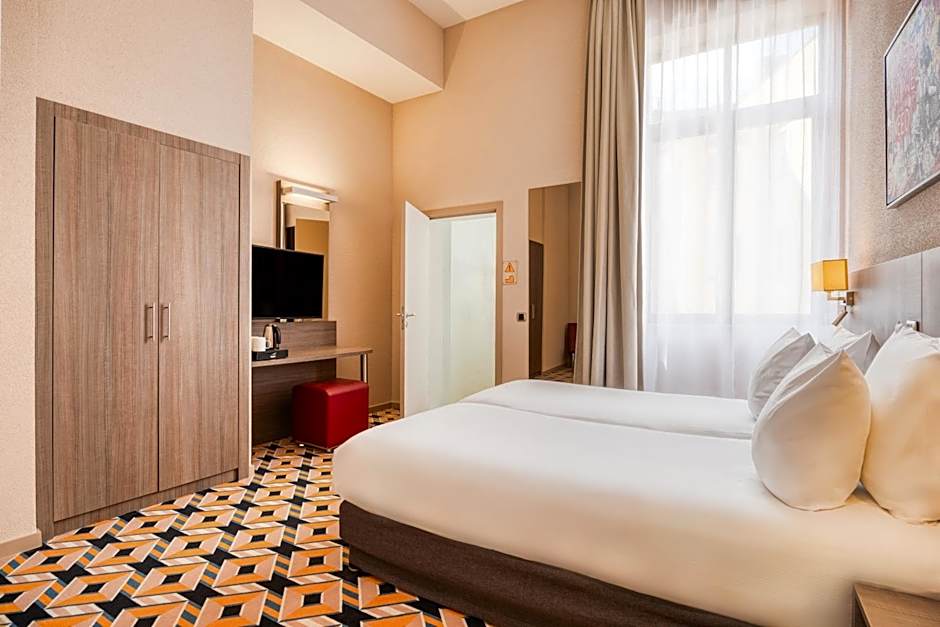 Alma Grand Place Hotel