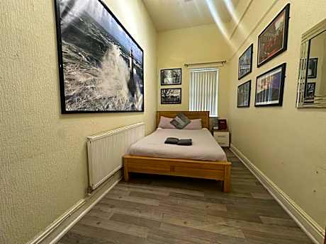 Standard Double Room with Shared Bathroom
