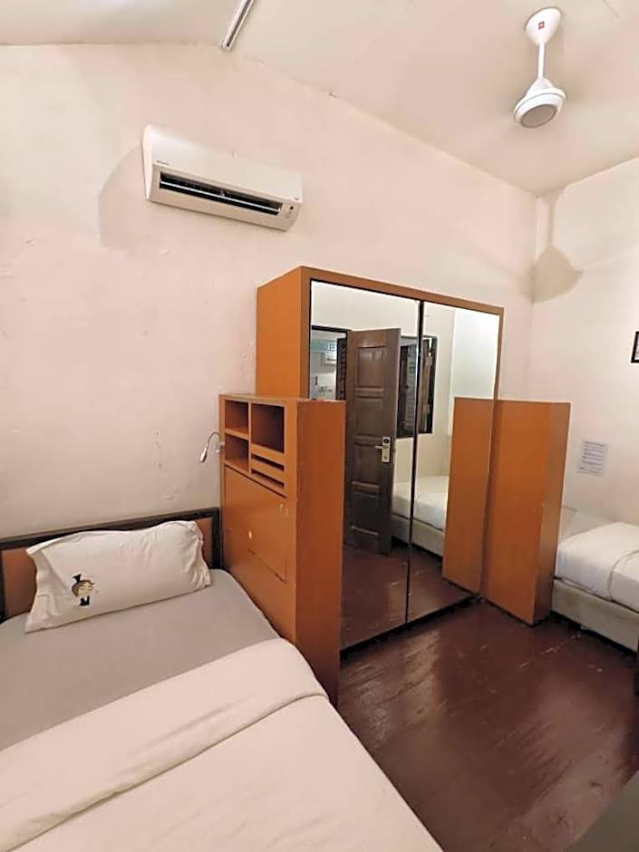 Photo 1 of 18 of Standard Twin Room with Shared Bathroom