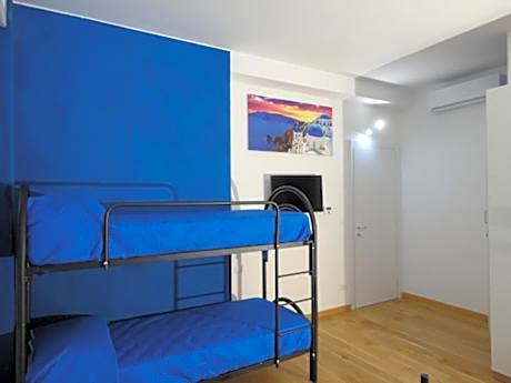 Quadruple Room with Private Bathroom