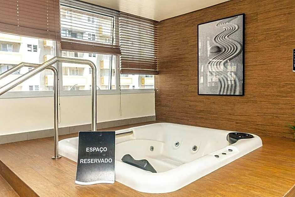 Studio moderno em condomínio de luxo pé na areia