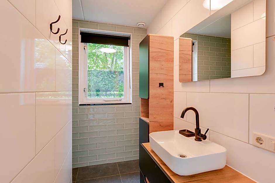 Het Huys Ewijk mooi luxe en een laadpaal