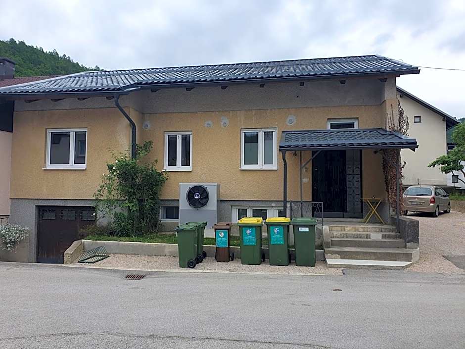 Fully equipped SIX BEDROOM HOUSE 15 kilometers from Lake Bled - with a terrace, garden, playground, and parking