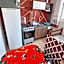 KITNET S2 em TORRES-RS - Na mais bela praia Gaúcha - Cozinha - Banheiro - Ar condicionado - TV smart 32' - Wi-Fi - Estacionamento - Anfitriã Superhost no BnB