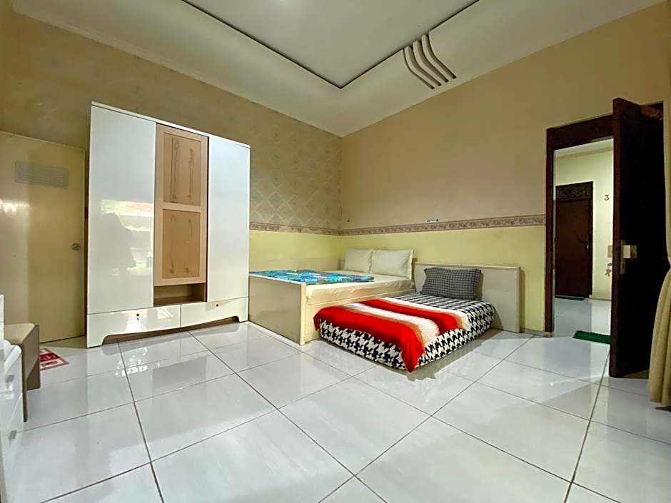 Homey Guesthouse near Sby Zoo (Syariah) 