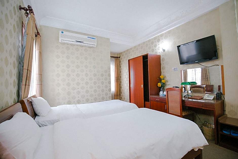 Photo 1 of 3 of Triple Room