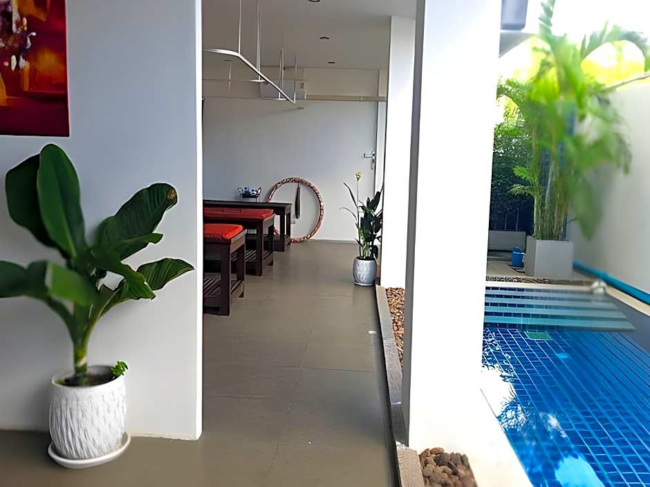 One World One Home Naiharn Hotel