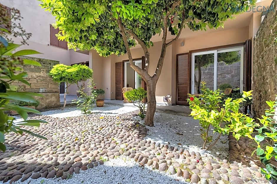 ClickSardinia Alghero Spectacular waterfront Neptune apartment with sea-facing terraces and garden