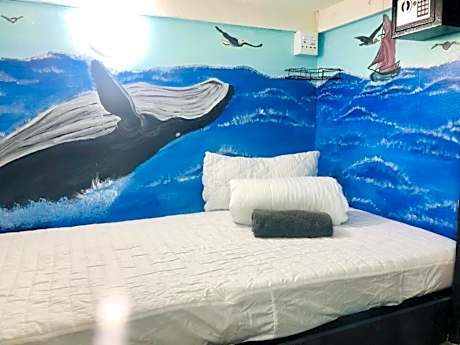 Single Bed in Dormitory Room