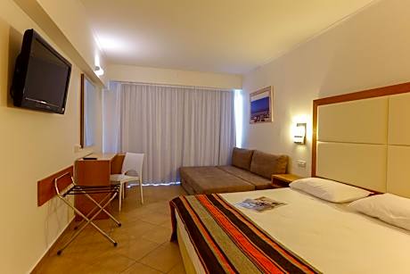 Triple Room (2 Adults + 1 Child)