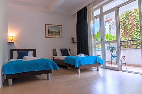 Two-Bedroom Family Apartment with Kitchen and Terrace