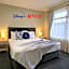 TOWER JUNCTION MOTOR LODGE- Motel with Airport and Railway Station Transport Service