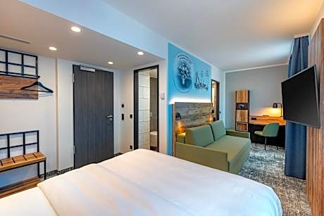 Modern Family Room with One Double Bed and One Sofa