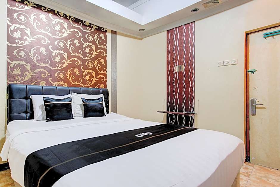 Capital O 93653 Kinasih Hotel