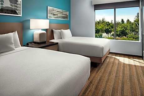 Executive Corner Suite with Two Queen Beds and Sofa Bed