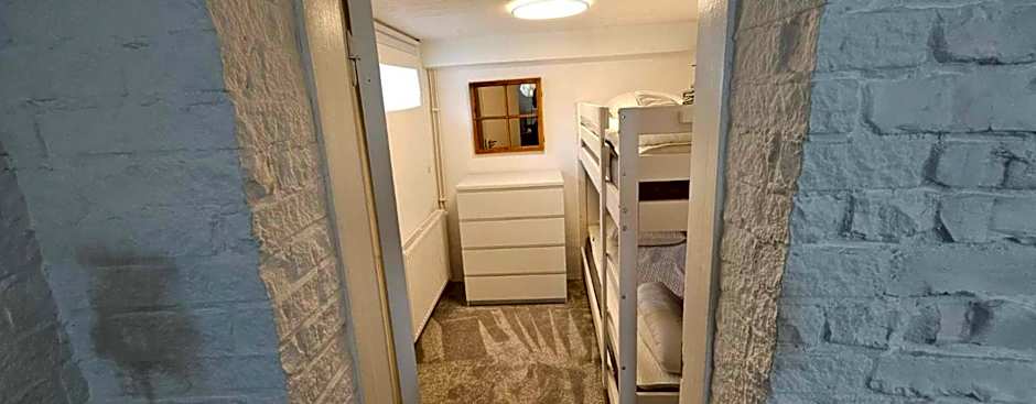 Comfortable guest rooms with fully equipped kitchen and cosy living room.