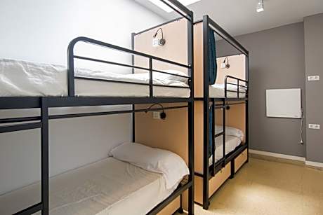 Bed in 4-Bed Female Dormitory Room with Shared Bathroom