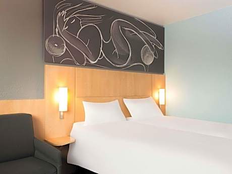 Room with two separate beds