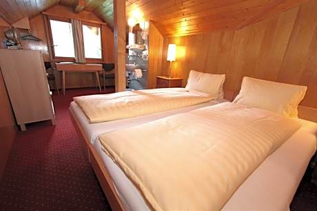 Simple attic room with Shared Bathroom (no elevator access)