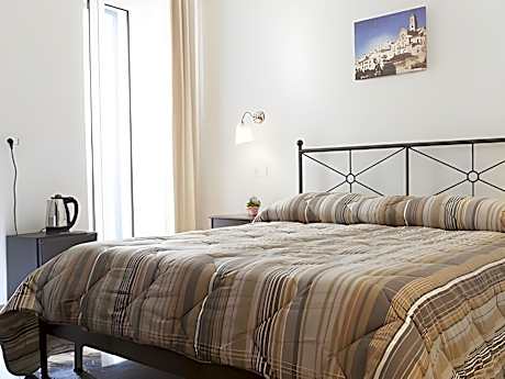 Familiare-Comunicanti-Bagno privato con doccia-Balcone-camera familiare