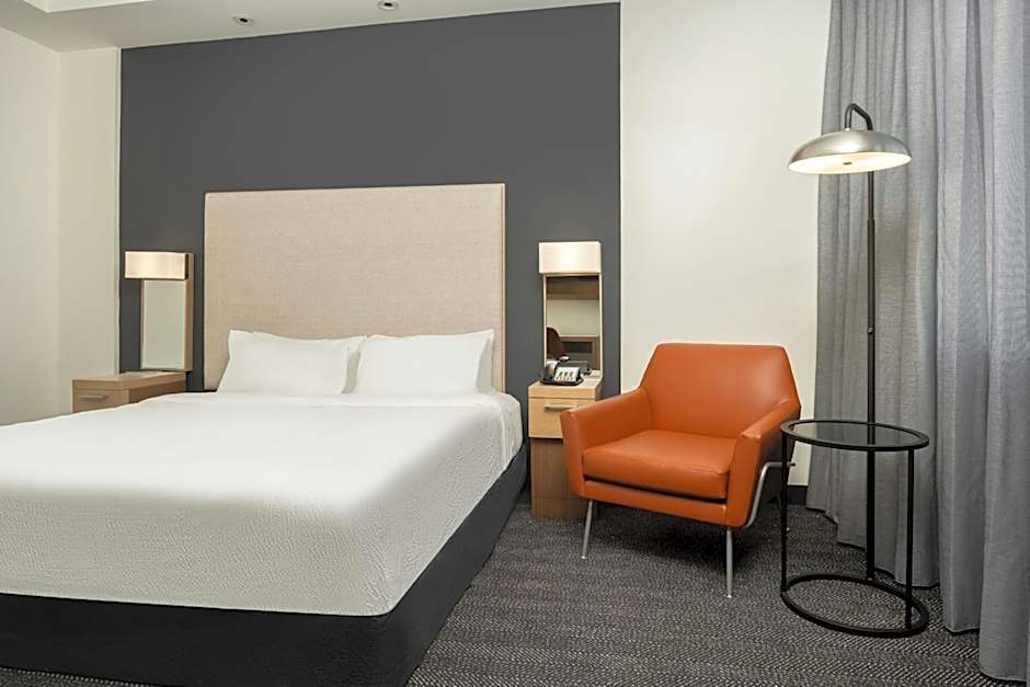 Photo 1 of 2 of 1 King Bed with Sofabed, Hearing/Mobility Accessible, Bathtub