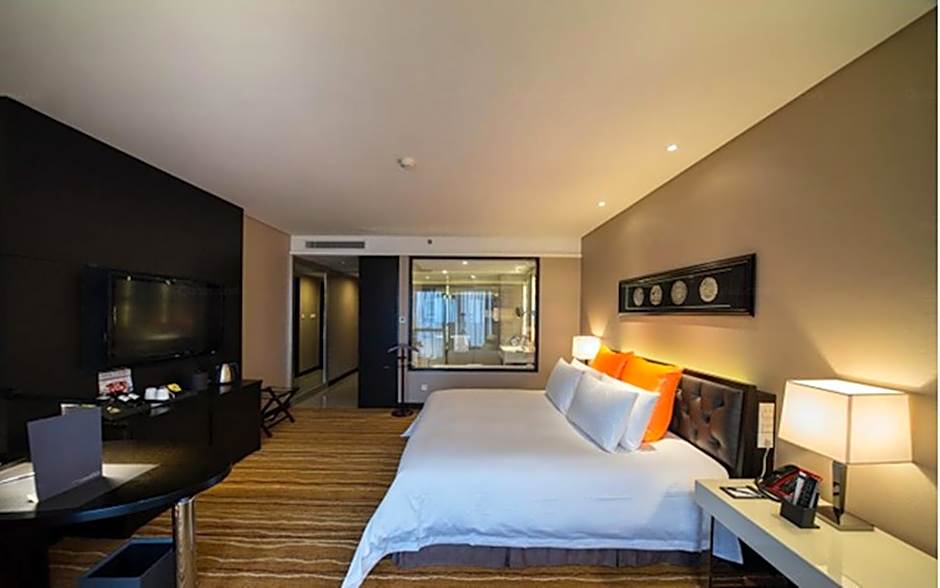 Zdjęcie 1 z 13 — Deluxe 1 King Bed