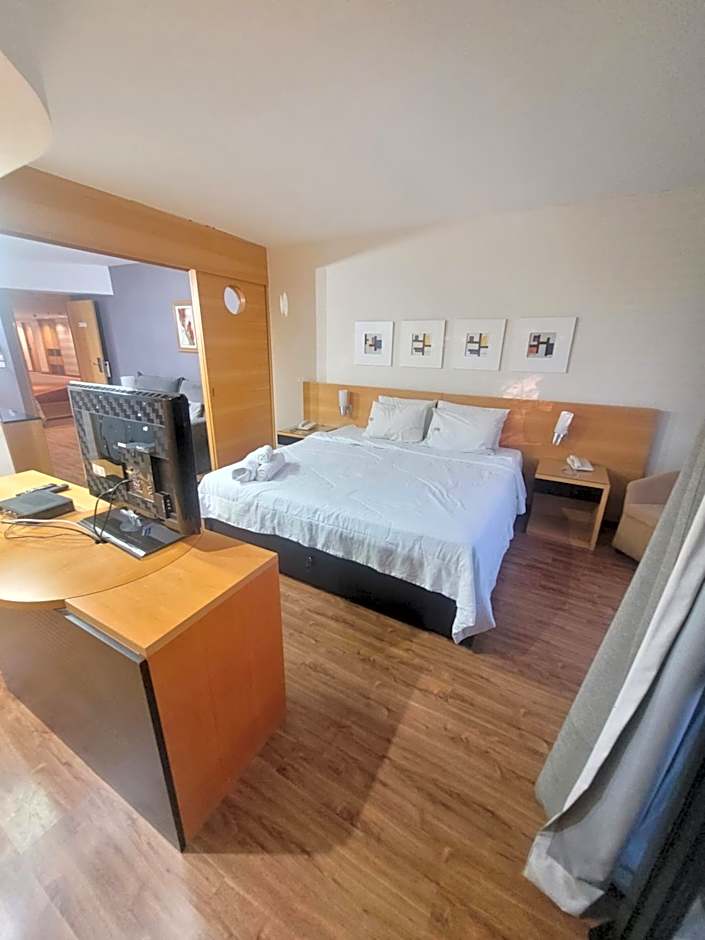 Flat no Golden Tulip By Rei dos Flats