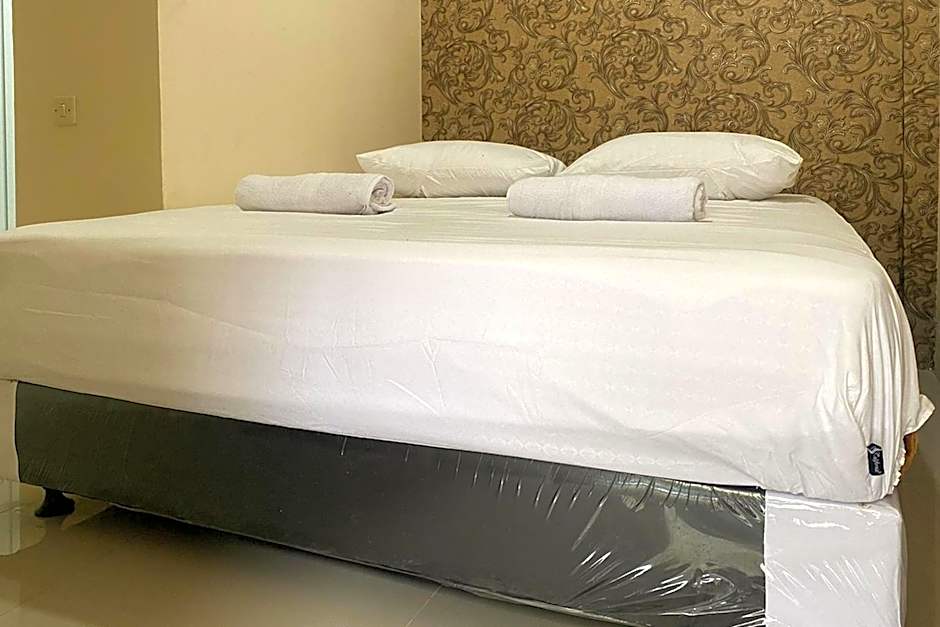 CK Homestay Syariah near Lippo Plaza Jambi Mitra RedDoorz