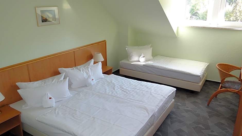 Photo 1 of 4 of Triple Room