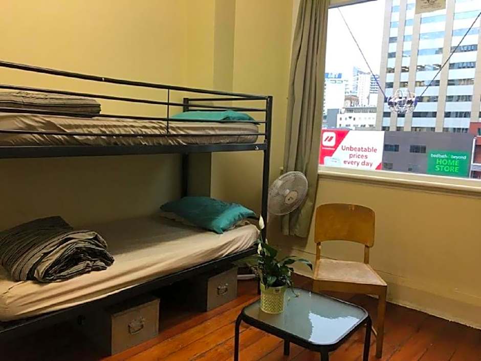 Surf 'N' Snow Backpackers Across Sky Tower