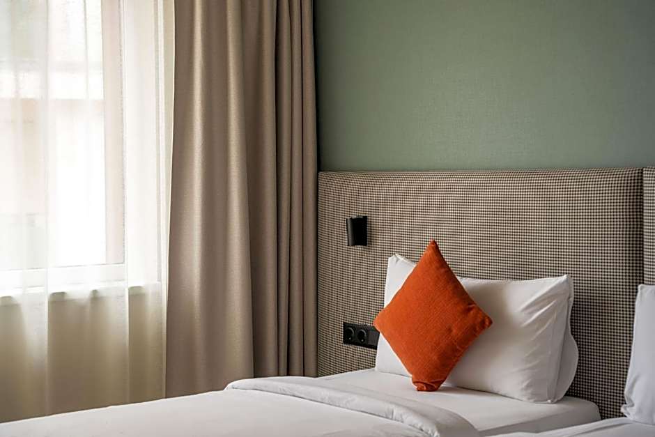 Escala Hotel & Suites