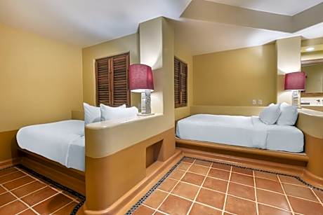 Two-Bedroom King Suite with Two Twin Beds and Partial Ocean View