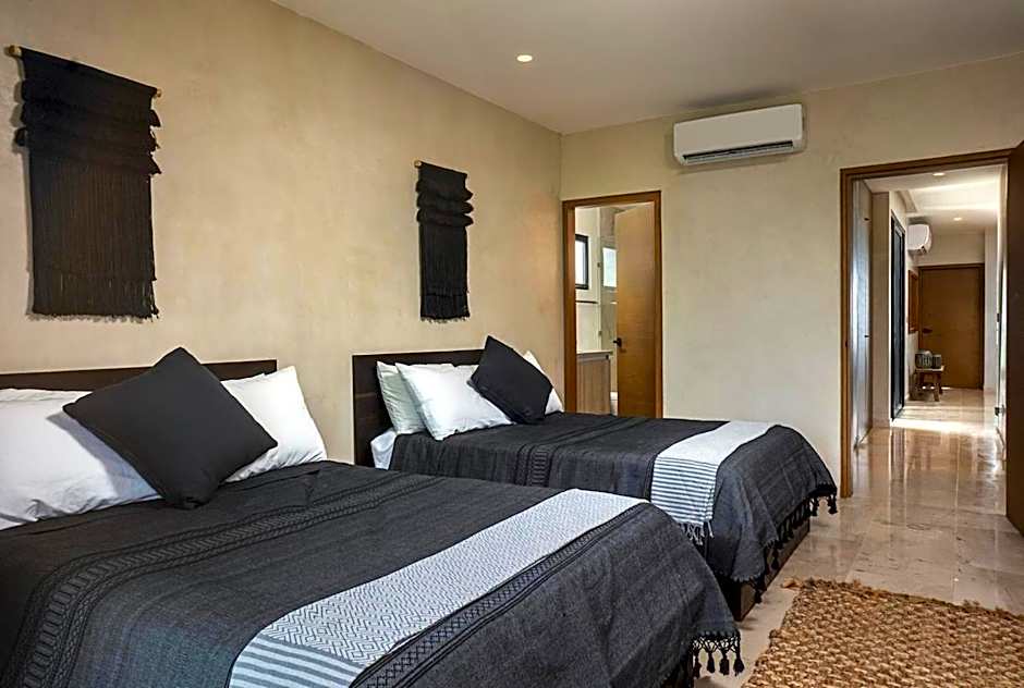 Beachfront 2BR Apartment at Tankah Bay