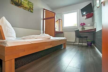 Doppelzimmer mit externem Badezimmer