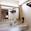 Magnuson Extended Stay and Suites Airport Hotel